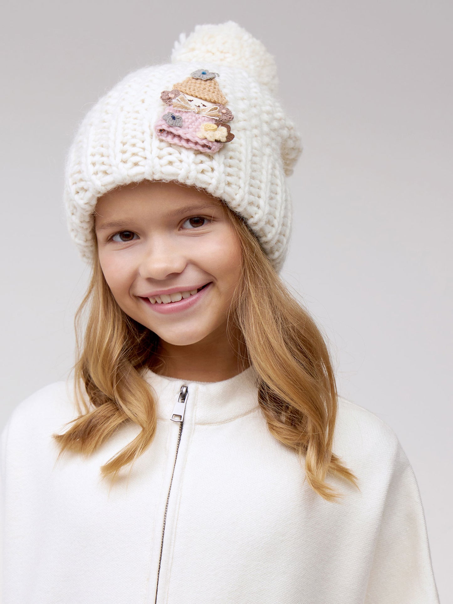 10036 Girls’ Warm Winter Hat with Pom-Pom & Knitted Doll Design – Baby Alpaca & Wool Blend | Sizes 3–5 Years | Cotton Lining