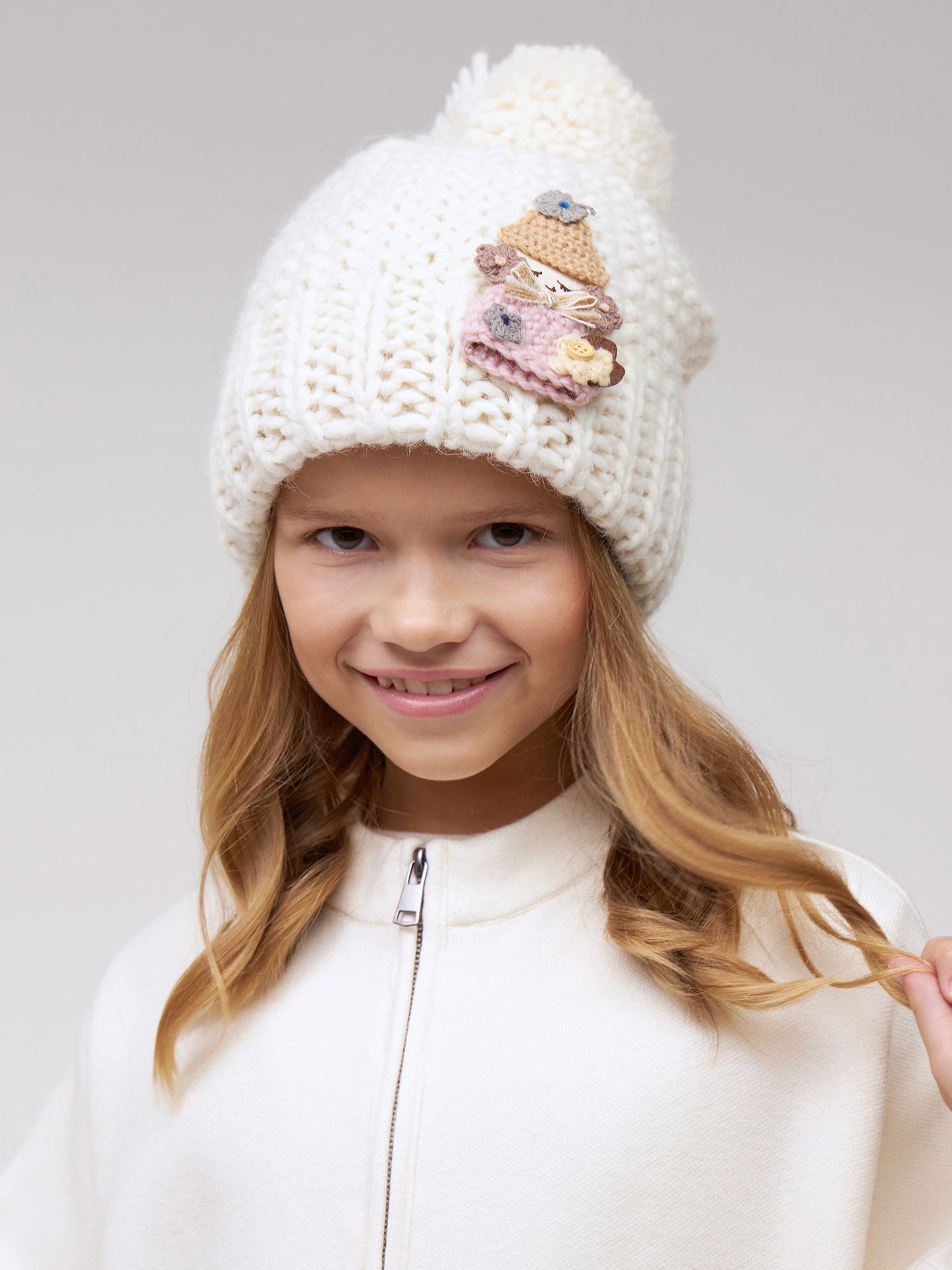 10036 Girls’ Warm Winter Hat with Pom-Pom & Knitted Doll Design – Baby Alpaca & Wool Blend | Sizes 3–5 Years | Cotton Lining