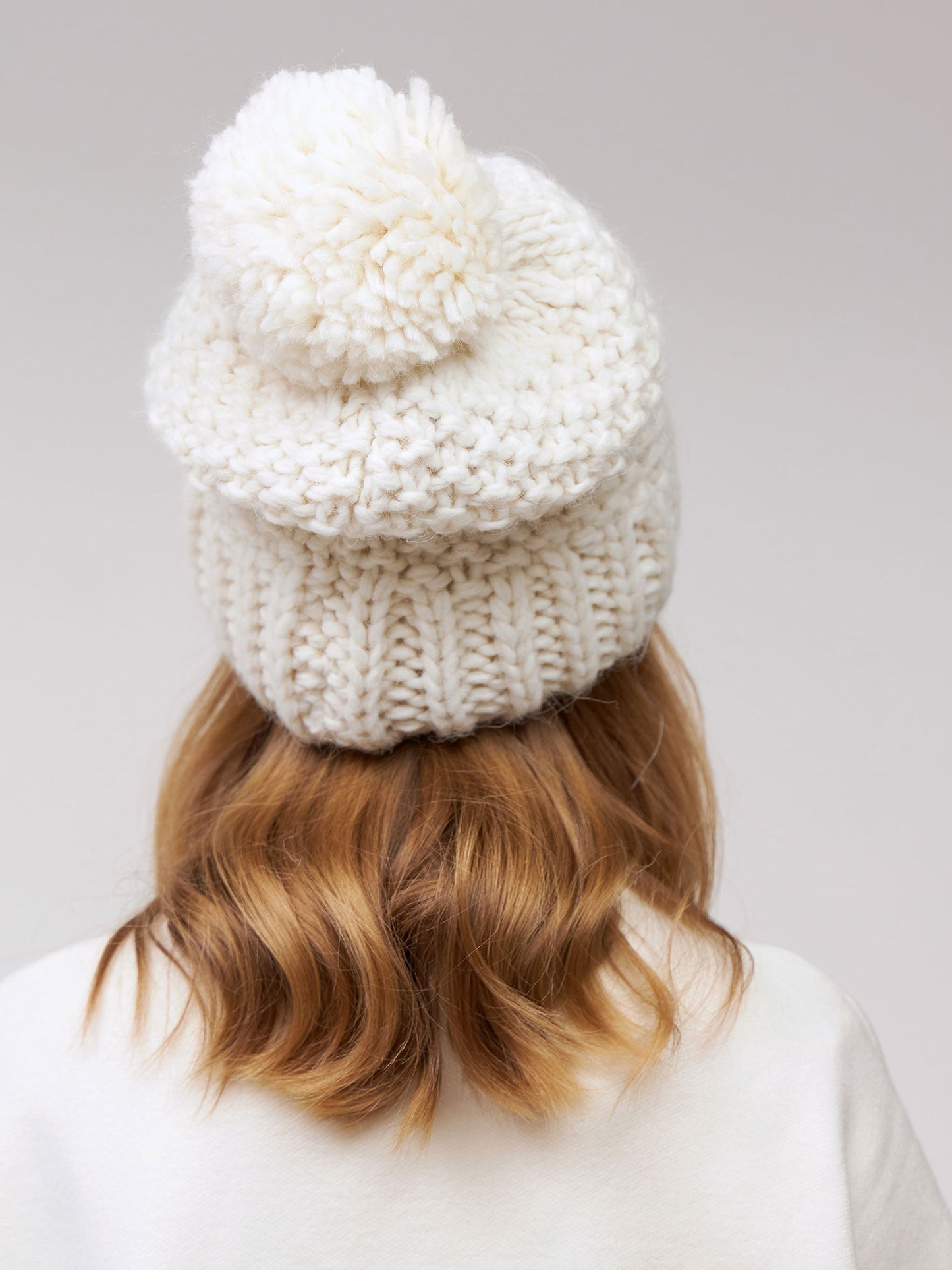 10036 Girls’ Warm Winter Hat with Pom-Pom & Knitted Doll Design – Baby Alpaca & Wool Blend | Sizes 3–5 Years | Cotton Lining