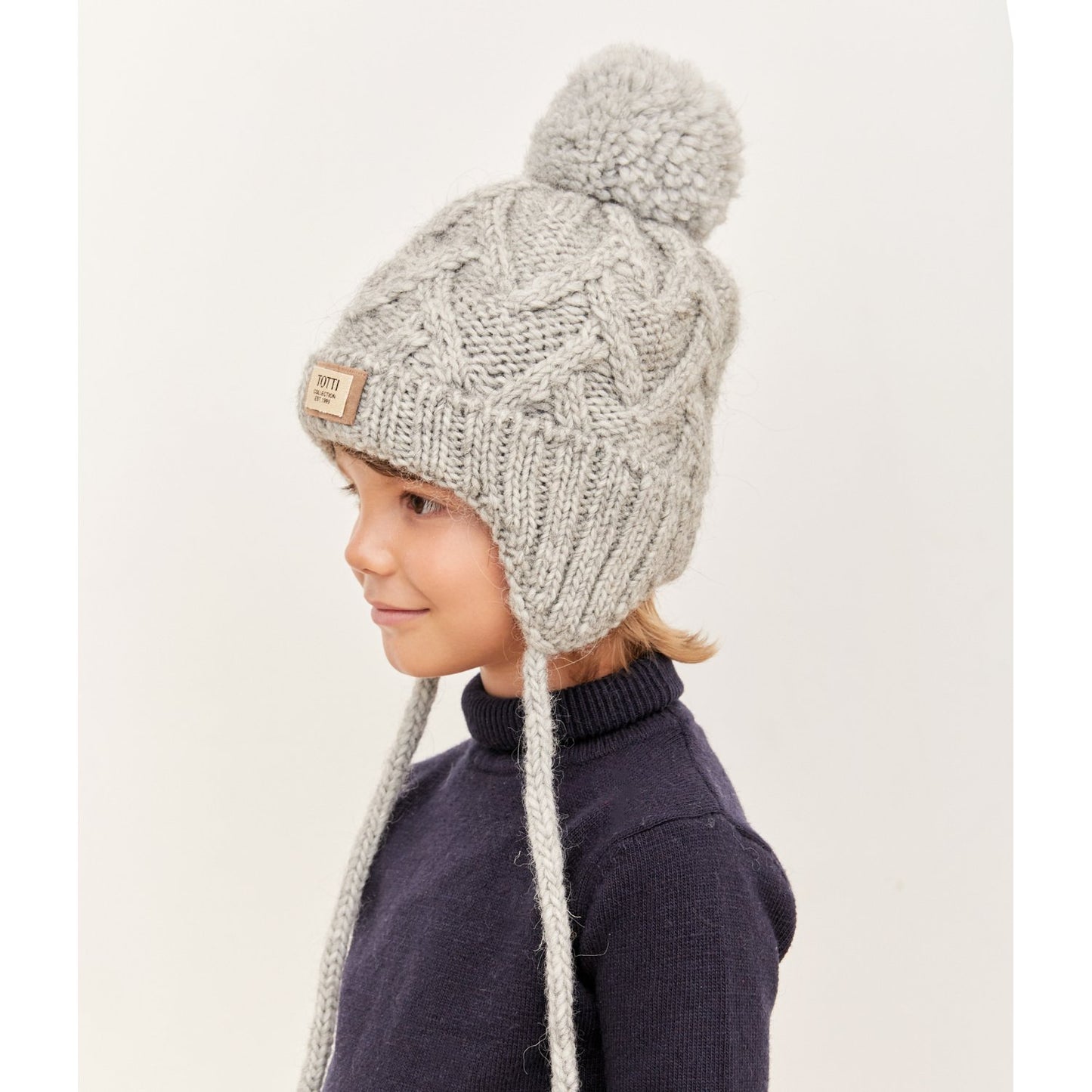 90039 Boys’ Winter Knit Hat with Pom-Pom & Earflaps – Gray Cable Knit Design | Size 52-54 | 3–5 years | Baby Alpaca, Wool | 100% Cotton Lining